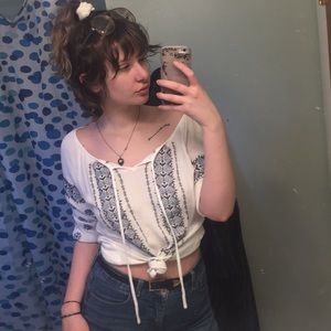 White, blue, black blouse